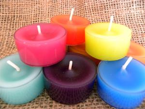 Hand poured tea lights come in many colours and scents.